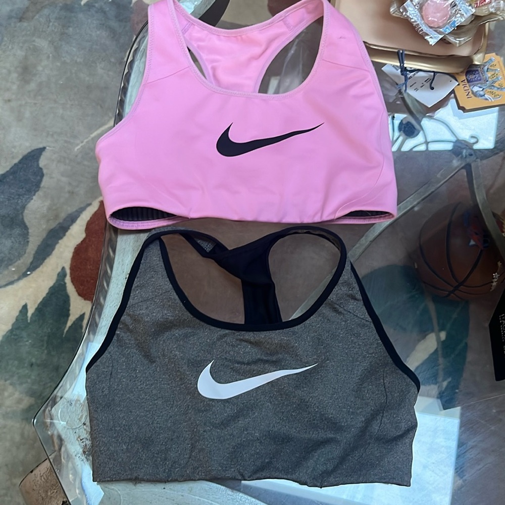 Two preowned Nike sports bras size xs